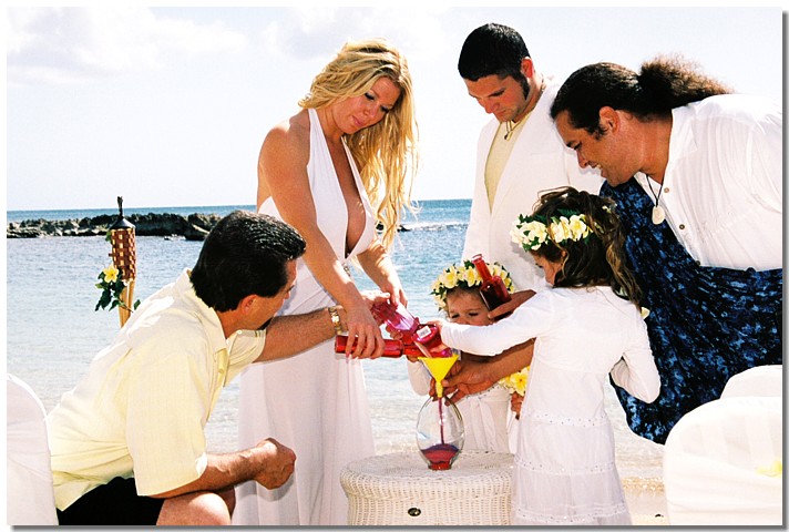 michelleand here flower girls all pour the sand together